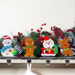 Northlight Set Of 4 Christmas Figures Stocking Holders With Silver Base