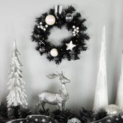 Northlight Pre-Lit Battery Operated Black Pine Christmas Wreath - 16" - Cool White LED Lights 11 Northlight Pre-Lit Battery Operated Black Pine Christmas Wreath - 16" - Cool White LED Lights -Festival northlight s92630 styled 2 45057.1684414649